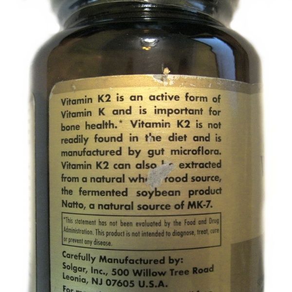 УЦІНКА Натуральний Вітамін К2, Solgar, Naturally Sourced Vitamin K2, 100 мкг, 50 вегетаріанських капсул (пошкодження зовнішньої плівки),  Solgar фото